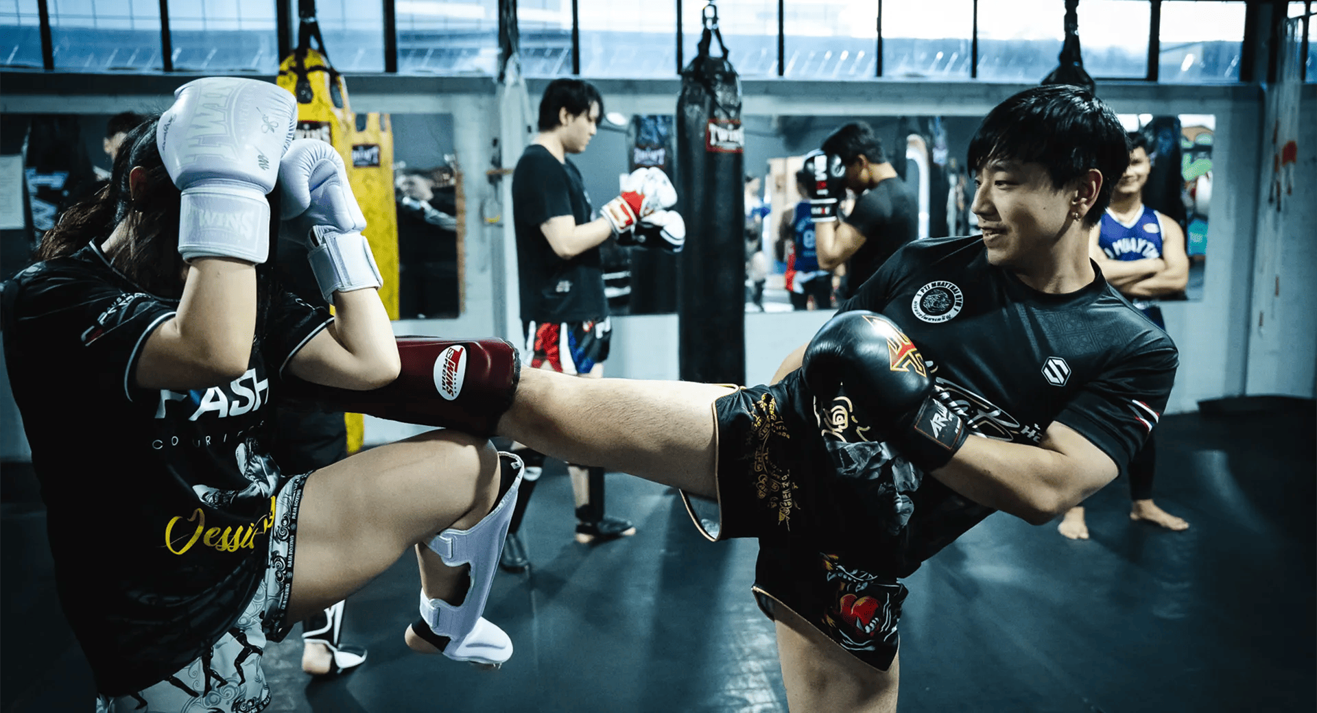 man taking a kickboxing class at PTJ Muaythai Gym