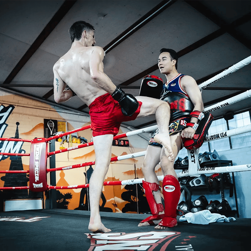man taking a kickboxing personal training class
